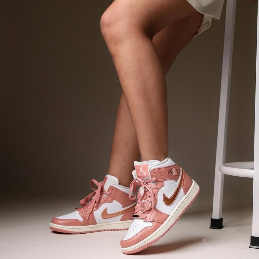 Nike Pink and White Sneakers High-Top Design